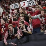 Fans cheer during the second half of the NCAA college football playoff championship game between Georgia and Alabama Monday, Jan. 8, 2018, in Atlanta. (AP Photo/David Goldman)