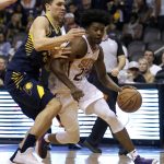 Phoenix Suns forward Josh Jackson (20) drives on Indiana Pacers forward T.J. Leaf in the second half during an NBA basketball game, Sunday, Jan. 14, 2018, in Phoenix. The Pacers defeated the Suns 120-97. (AP Photo/Rick Scuteri)