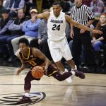 Arizona State guard Tra Holder, front, drives past Colorado guard George King during the first half of an NCAA college basketball game Thursday, Jan. 4, 2018, in Boulder, Colo. (AP Photo/David Zalubowski)