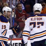 Edmonton Oilers left wing Patrick Maroon (19) celebrates his goal against the Arizona Coyotes with defenseman Oscar Klefbom (77) during the first period of an NHL hockey game, Friday, Jan. 12, 2018, in Glendale, Ariz. (AP Photo/Ross D. Franklin)