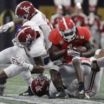Georgia running back Sony Michel runs for a first down during the first half of the NCAA college football playoff championship game against Alabama Monday, Jan. 8, 2018, in Atlanta. (AP Photo/David J. Phillip)