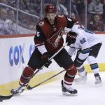 Arizona Coyotes defenseman Jason Demers skates away from San Jose Sharks right wing Kevin Labanc (62) in the first period during an NHL hockey game, Tuesday, Jan. 16, 2018, in Glendale, Ariz. (AP Photo/Rick Scuteri)