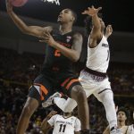 Oregon State guard Ronnie Stacy (2) drives past Arizona State guard Remy Martin during the first half of an NCAA college basketball game Saturday, Jan. 13, 2018, in Tempe, Ariz. (AP Photo/Rick Scuteri)