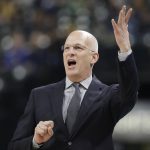 Phoenix Suns interim coach Jay Triano argues a call during the first half of an NBA basketball game against the Indiana Pacers, Wednesday, Jan. 24, 2018, in Indianapolis. (AP Photo/Darron Cummings)