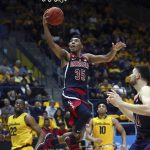 Arizona's Allonzo Trier (35) lays upa a shot against California in the second half of an NCAA college basketball game Wednesday, Jan. 17, 2018, in Berkeley, Calif. (AP Photo/Ben Margot)