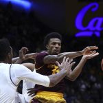 Arizona State's Shannon Evans II, right, passes the ball away from California's Marcus Lee (24) during the second half of an NCAA college basketball game Saturday, Jan. 20, 2018, in Berkeley, Calif. (AP Photo/Ben Margot)