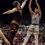 Stanford guard Dorian Pickens (11) shoots over Arizona State forward Mickey Mitchell during the second half of an NCAA college basketball game Wednesday, Jan. 17, 2018, in Stanford, Calif. (AP Photo/Marcio Jose Sanchez)