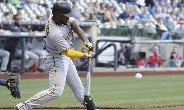 Pittsburgh Pirates' Andrew McCutchen hits a two--run single during the first inning of a baseball g...