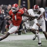 Georgia running back Sony Michel runs doer a first down during the first half of the NCAA college football playoff championship game against Alabama Monday, Jan. 8, 2018, in Atlanta. (AP Photo/David J. Phillip)