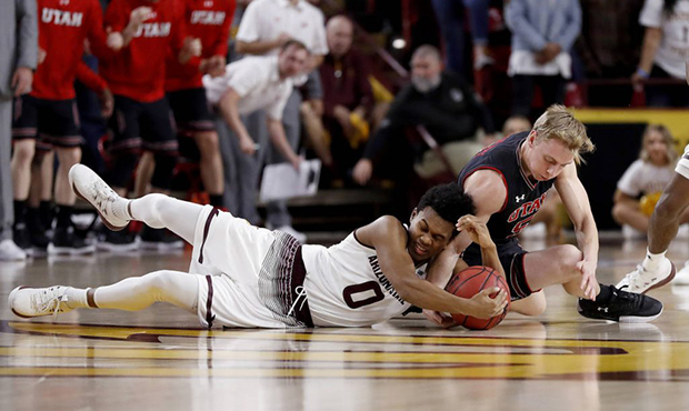 Arizona State guard Tra Holder (0) and Utah guard Parker Van Dyke (5) vie for a loose ball during t...