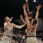 Arizona State forward Romello White, center, shoots over Stanford forward Reid Travis (22) and forward Michael Humphrey during the first half of an NCAA college basketball game Wednesday, Jan. 17, 2018, in Stanford, Calif. (AP Photo/Marcio Jose Sanchez)