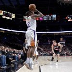 Phoenix Suns guard Isaiah Canaan shoots a three point basket against the Portland Trail Blazers during the second half of an NBA basketball game in Portland, Ore., Tuesday, Jan. 16, 2018. (AP Photo/Craig Mitchelldyer)