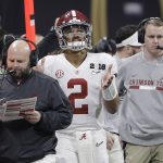 Alabama quarterback Jalen Hurts watches from the sidelines during the second half of the NCAA college football playoff championship game against Georgia, Monday, Jan. 8, 2018, in Atlanta. (AP Photo/David J. Phillip)