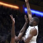 California's Kingsley Okoroh, right, shoots over Arizona State's Romello White during the first half of an NCAA college basketball game Saturday, Jan. 20, 2018, in Berkeley, Calif. (AP Photo/Ben Margot)