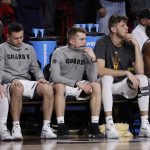 Players on the Arizona State bench watch during the second half of the team's NCAA college basketball game against Utah, Thursday, Jan. 25, 2018, in Tempe, Ariz. Utah won 80-77 in overtime. (AP Photo/Matt York)