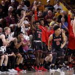 Players on the Utah bench cheer during the second half of an NCAA college basketball game against Arizona State, Thursday, Jan. 25, 2018, in Tempe, Ariz. Utah won 80-77 in overtime. (AP Photo/Matt York)