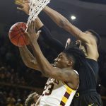 Arizona State forward Romello White (23) grabs a rebound in front of Oregon forward Kenny Wooten, right, during the first half of an NCAA college basketball game, Thursday, Jan. 11, 2018, in Tempe, Ariz. (AP Photo/Ross D. Franklin)