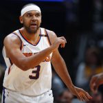 Phoenix Suns forward Jared Dudley reacts after hitting a 3-point basket against the Denver Nuggets during the first half of an NBA basketball game Friday, Jan. 19, 2018, in Denver. (AP Photo/David Zalubowski)