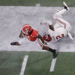 Georgia wide receiver Mecole Hardman gets past Alabama defensive back Tony Brown for a touchdown catch during the second half of the NCAA college football playoff championship game Monday, Jan. 8, 2018, in Atlanta. (AP Photo/John Bazemore)