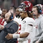Alabama quarterback Jalen Hurts watches from the bench during the second half of the NCAA college football playoff championship game against Georgia Monday, Jan. 8, 2018, in Atlanta. (AP Photo/David Goldman)