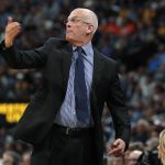 Phoenix Suns coach Jay Triano makes a point during the second half of the team's NBA basketball game against the Denver Nuggets on Friday, Jan. 19, 2018, in Denver. Phoenix won 108-100. (AP Photo/David Zalubowski)