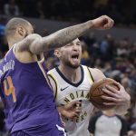 Indiana Pacers' Domantas Sabonis goes to the basket against Phoenix Suns' Tyson Chandler during the first half of an NBA basketball game Wednesday, Jan. 24, 2018, in Indianapolis. (AP Photo/Darron Cummings)