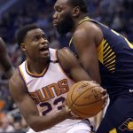 Phoenix Suns forward Danuel House Jr. (23) drives on Indiana Pacers center Al Jefferson in the second half during an NBA basketball game, Sunday, Jan. 14, 2018, in Phoenix. The Pacers defeated the Suns 120-97. (AP Photo/Rick Scuteri)