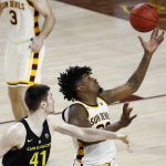 Arizona State forward Romello White, right, grabs a loose ball in front of Oregon forward Roman Sorkin (41) during the second half of an NCAA college basketball game Thursday, Jan. 11, 2018, in Tempe, Ariz. Oregon defeated Arizona State 76-72. (AP Photo/Ross D. Franklin)