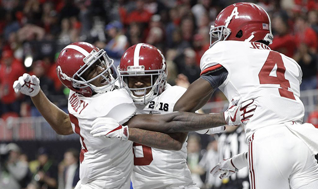 Alabama wide receiver DeVonta Smith (6) celebrates his touchdown during overtime of the NCAA colleg...