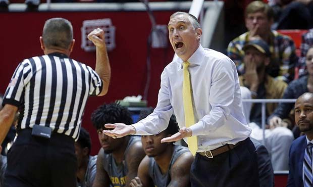 Arizona State head coach Bobby Hurley argues with an official in the first half of an NCAA college ...