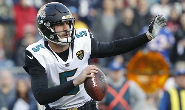 Jacksonville Jaguars quarterback Blake Bortles scrambles against the New England Patriots during th...