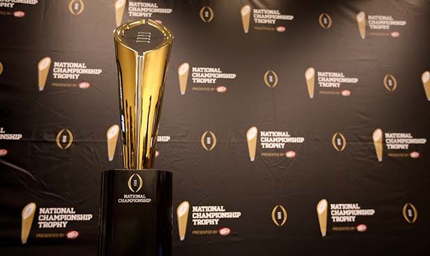 This Monday, July 14, 2014 photo shows the College Football Playoff National Championship Trophy in...