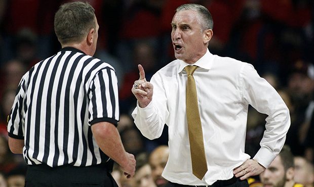 Arizona State coach Bobby Hurley, right, makes his point to official Dave Hall during the second ha...