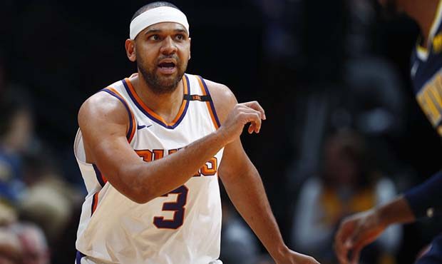 Phoenix Suns forward Jared Dudley reacts after hitting a 3-point basket against the Denver Nuggets ...