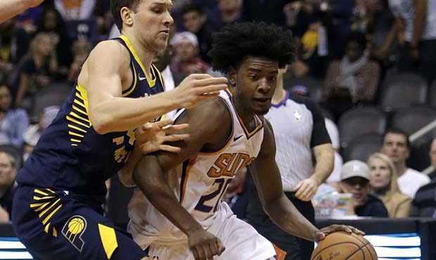 Phoenix Suns forward Josh Jackson (20) drives on Indiana Pacers forward T.J. Leaf in the second hal...