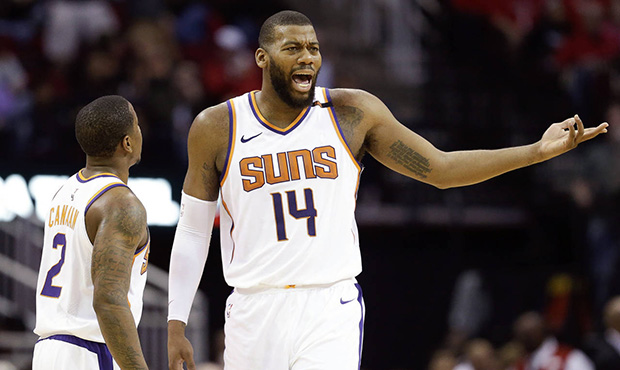 Phoenix Suns center Greg Monroe (14) reacts after being ejected for his second technical foul as te...