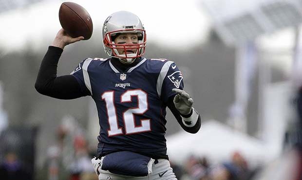 New England Patriots quarterback Tom Brady passes against the New York Jets during the first half o...