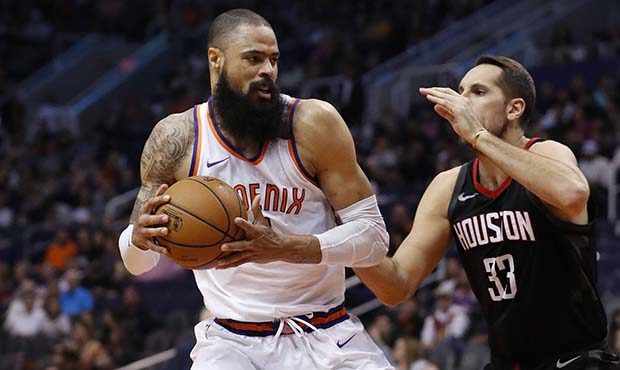 Phoenix Suns center Tyson Chandler dries on Houston Rockets forward Ryan Anderson (33) during the s...