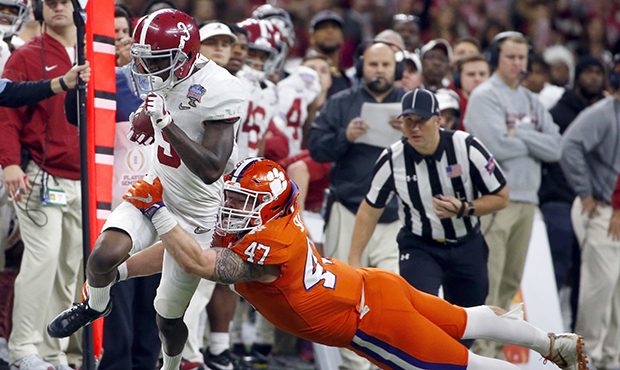 FILE - In this Monday, Jan. 1, 2018, file photo, Alabama wide receiver Calvin Ridley (3) is tackled...