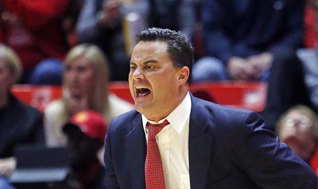 Arizona head coach Sean Miller shouts to his team in the first half during an NCAA college basketba...