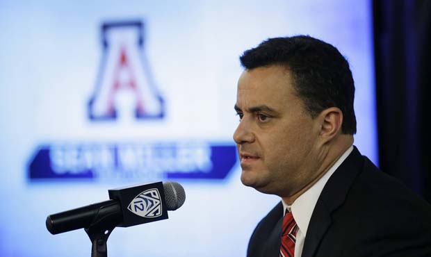 Arizona coach Sean Miller listens to questions during the Pac-12's NCAA college basketball media da...