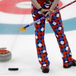 Norway's Haavard Vad Petersson holds his broom during a men's curling match against South Korea at the 2018 Winter Olympics in Gangneung, South Korea, Friday, Feb. 16, 2018. (AP Photo/Natacha Pisarenko)