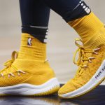 Utah Jazz guard Donovan Mitchell wears a shoe with "Pray for Parkland" written on it, during the second half of the team's NBA basketball game against the Phoenix Suns on Wednesday, Feb. 14, 2018, in Salt Lake City. (AP Photo/Rick Bowmer)