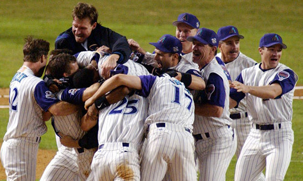 FILE - In this Nov. 4, 2001, file photo, the Arizona Diamondbacks celebrate their ninth-inning vict...