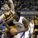 Washington forward Noah Dickerson (15) tries to put up a shot against the defense of Arizona State guard Kodi Justice as Arizona State forward Romello White (23) looks on in the first half of an NCAA college basketball game, Thursday, Feb. 1, 2018, in Seattle. (AP Photo/Ted S. Warren)