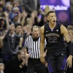 Washington's Dominic Green reacts after sinking a 3-point basket during the second half against Arizona in an NCAA college basketball game Saturday, Feb. 3, 2018, in Seattle. Washington won 78-75 with Green later hitting the tie-breaking shot in the final seconds. (AP Photo/John Froschauer)