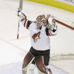 Arizona Coyotes goaltender Antti Raanta, from Finland, celebrates after the Coyotes defeated the San Jose Sharks 2-1 in an NHL hockey game in San Jose, Calif., Tuesday, Feb. 13, 2018. (AP Photo/Jeff Chiu)