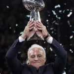 Philadelphia Eagles owner Jeffrey Lurie holds up the Vince Lombardi Trophy after the NFL Super Bowl 52 football game against the New England Patriots, Sunday, Feb. 4, 2018, in Minneapolis. The Eagles won 41-33. (AP Photo/Matt Slocum)
