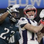 New England Patriots' Chris Hogan, right, catches a touchdown pass in front of Philadelphia Eagles' Rodney McLeod during the second half of the NFL Super Bowl 52 football game Sunday, Feb. 4, 2018, in Minneapolis. (AP Photo/Mark Humphrey)