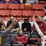 Arizona State guard Shannon Evans II (11) shoots while defended by Washington State guard Malachi Flynn (22) during the first half of an NCAA college basketball game in Pullman, Wash., Sunday, Feb. 4, 2018. (AP Photo/Young Kwak)